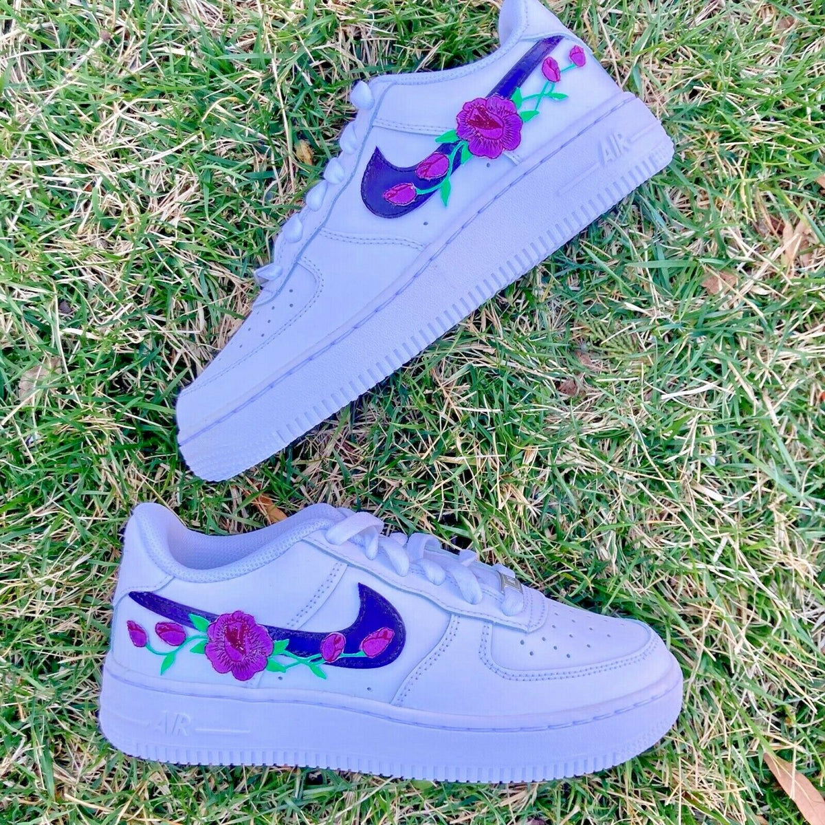 blue nike shoes with flowers