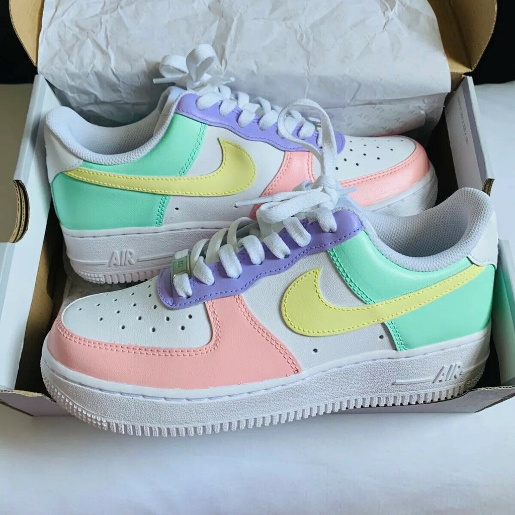 Purple yellow blue best sale pink nikes