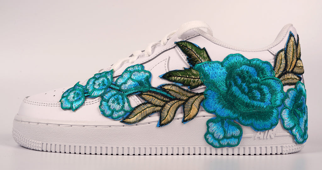 Teal nikes clearance with flowers